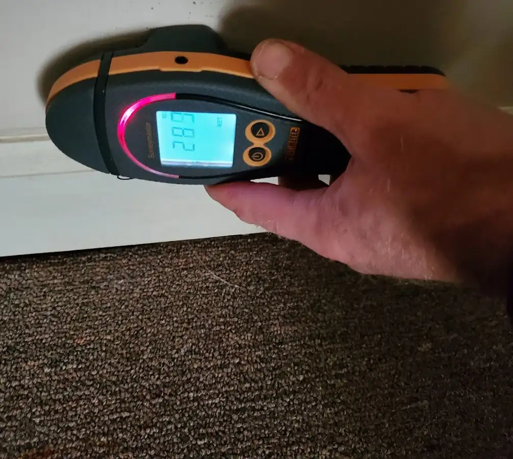 Moisture detection at baseboard during Storm Damage Restoration in Collingswood